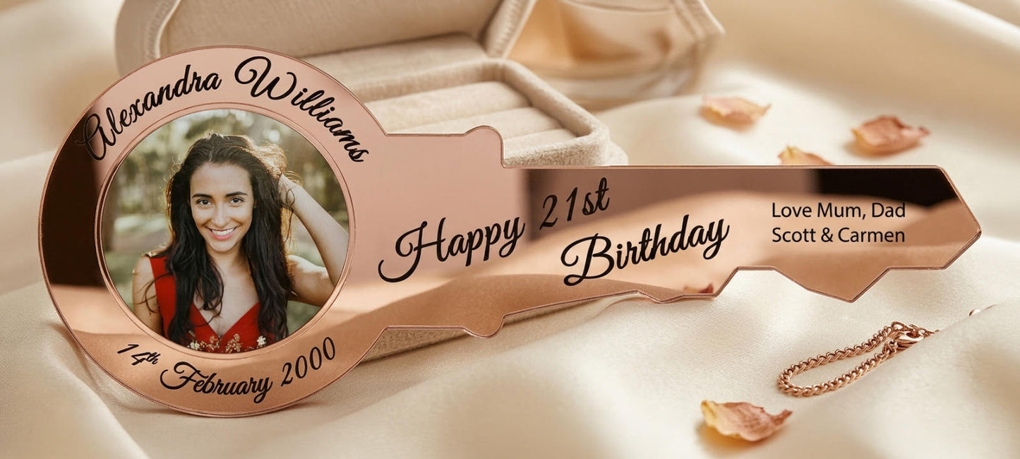 Custom 21st birthday key made from 3mm rose gold mirror acrylic and 6mm wood backing with an attached zinc chain, showing a personalised photo and name.